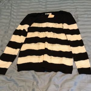 black and cream sweater